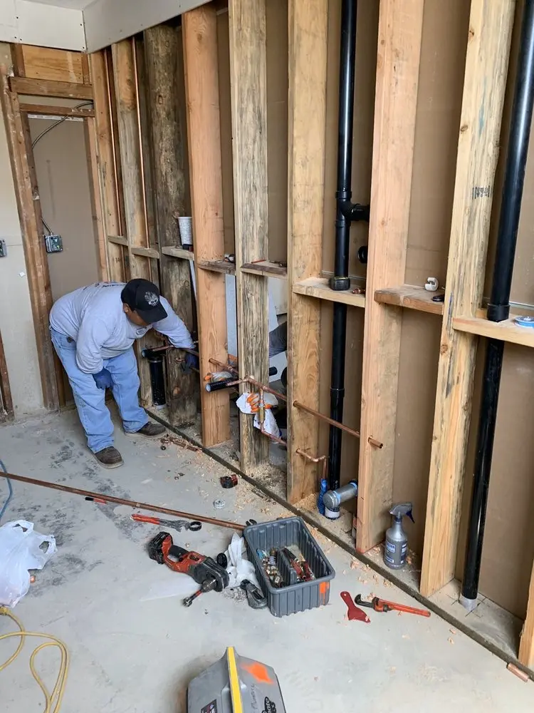 Commercial rough-in plumbing for Water Heater Replacement in Rehak